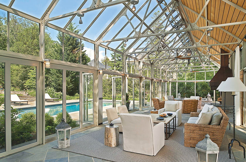 Andrew Law furnished the interior in a neutral palette. Steel trusses are softened by mahogany slats.