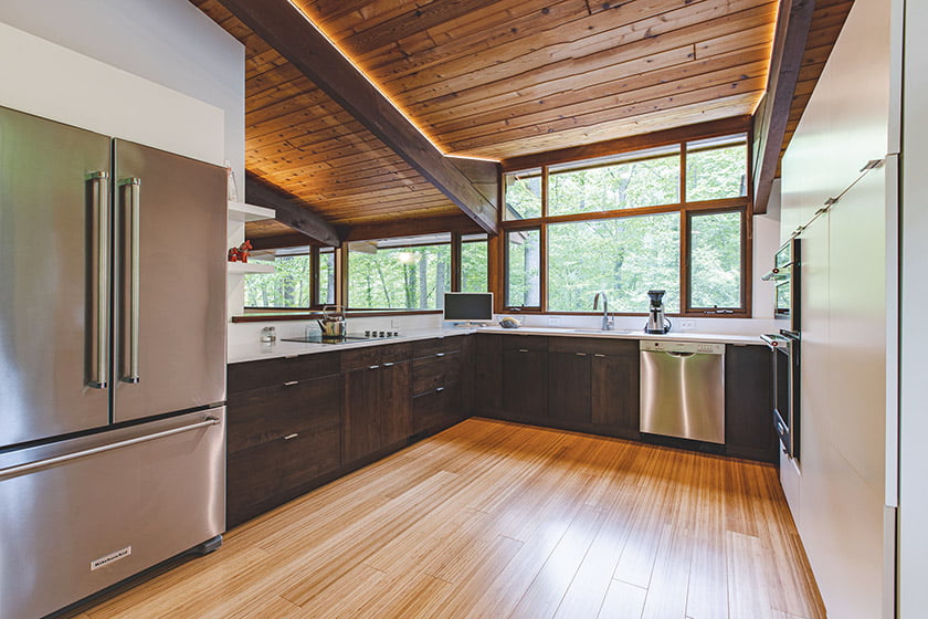 Sleek bamboo flooring in a Fairfax Station remodel by FineCraft Contractors. Photo: Kaan Ozturk