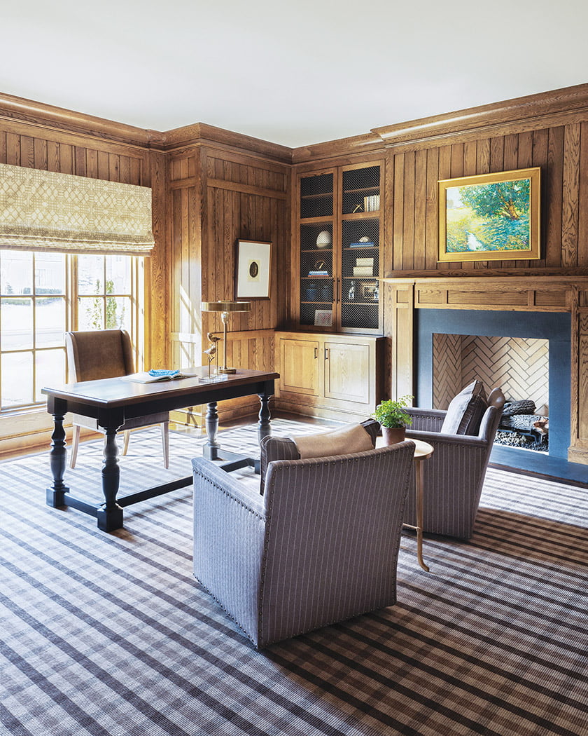 A bespoke rug from Carpet Creations gives the study its masculine feel.