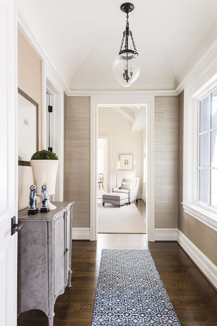 A Kellogg Collection runner brings pattern and color to the master-suite vestibule.