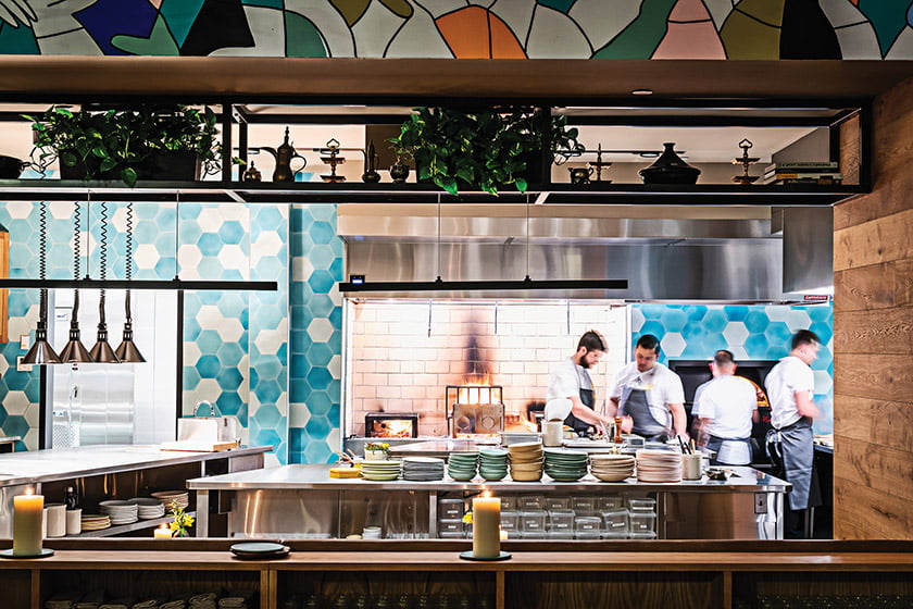 Albi's open kitchen features live fire and a wood-fired pita oven. Photo: Scott Suchman