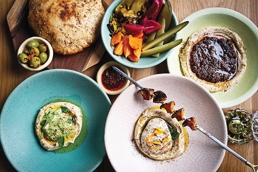 The enticing menu offers an array of hummus plates. Photo: Scott Suchman