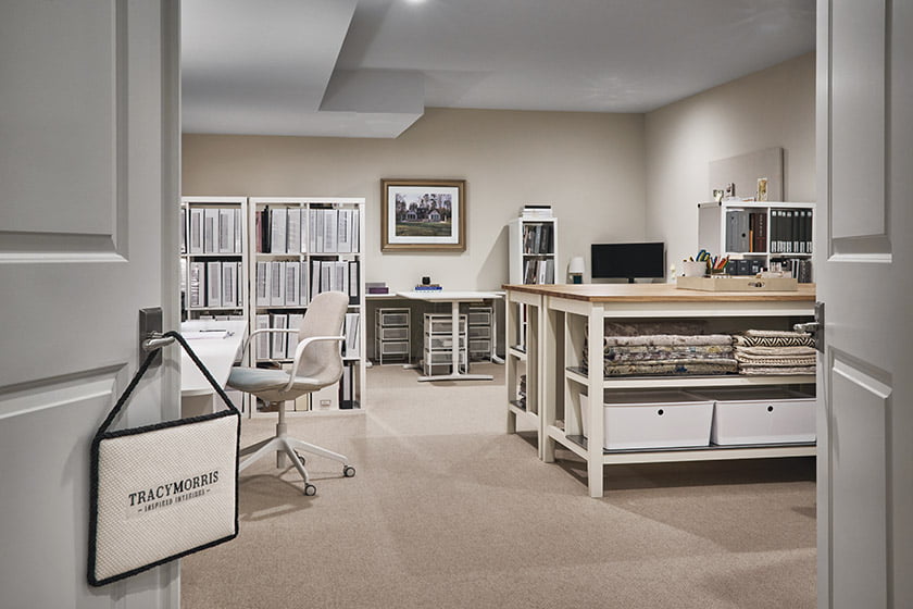 Morris’ downstairs studio features workstations and repurposed kitchen islands offering additional work surfaces.