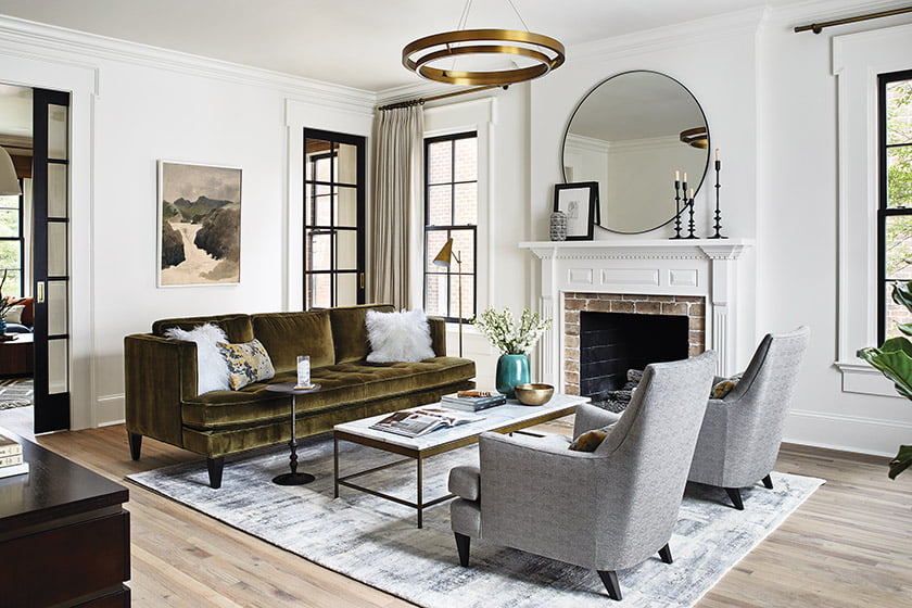 In the living room. a Room & Board sofa