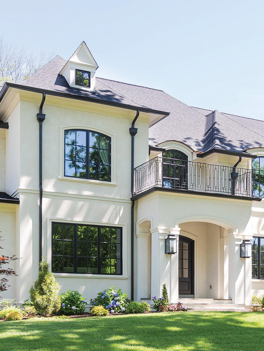 A custom home in McLean is enhanced by French architectural flourishes.