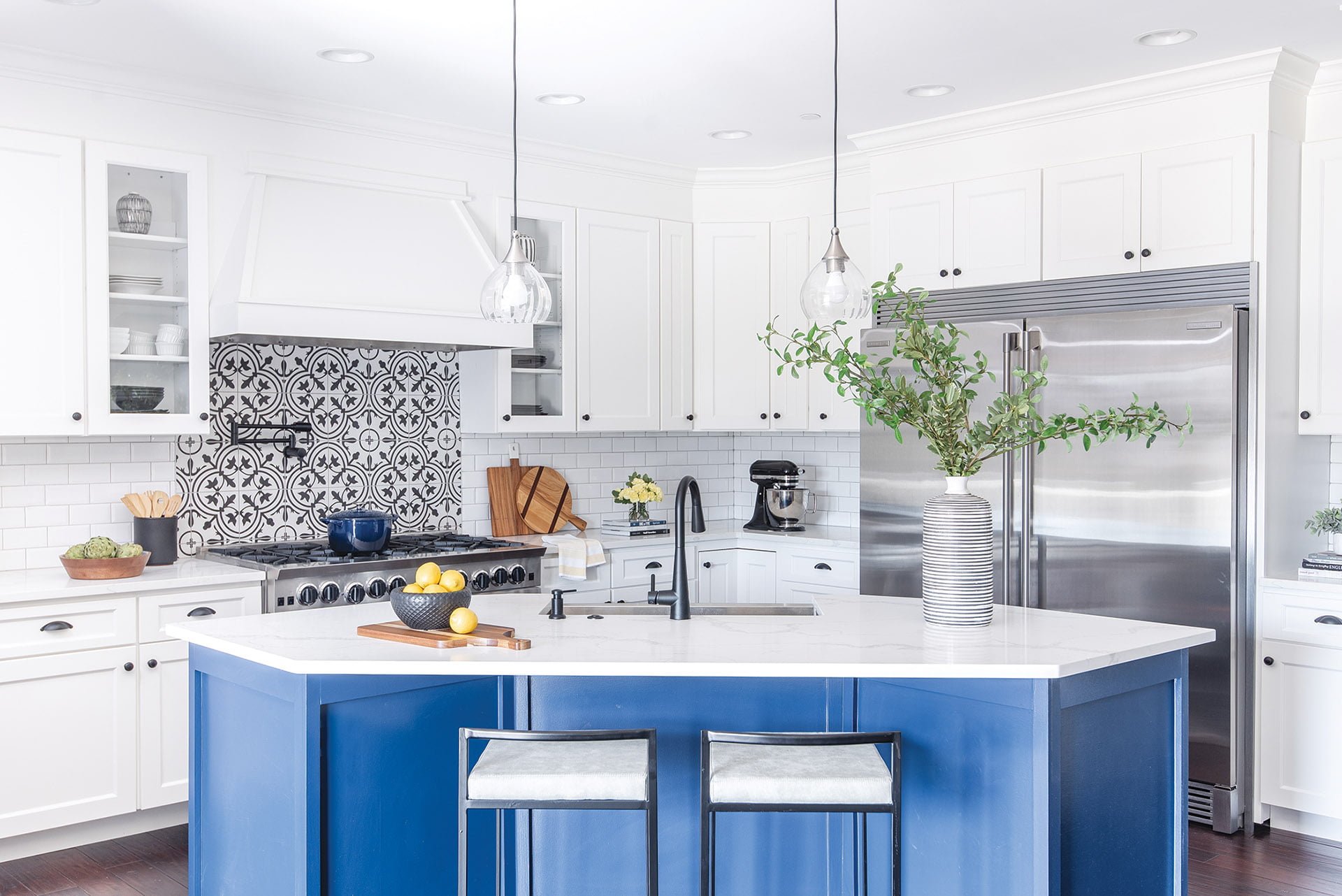 Kitchen with ceramic tile and island painted in Sherwin-Williams Salty Dog