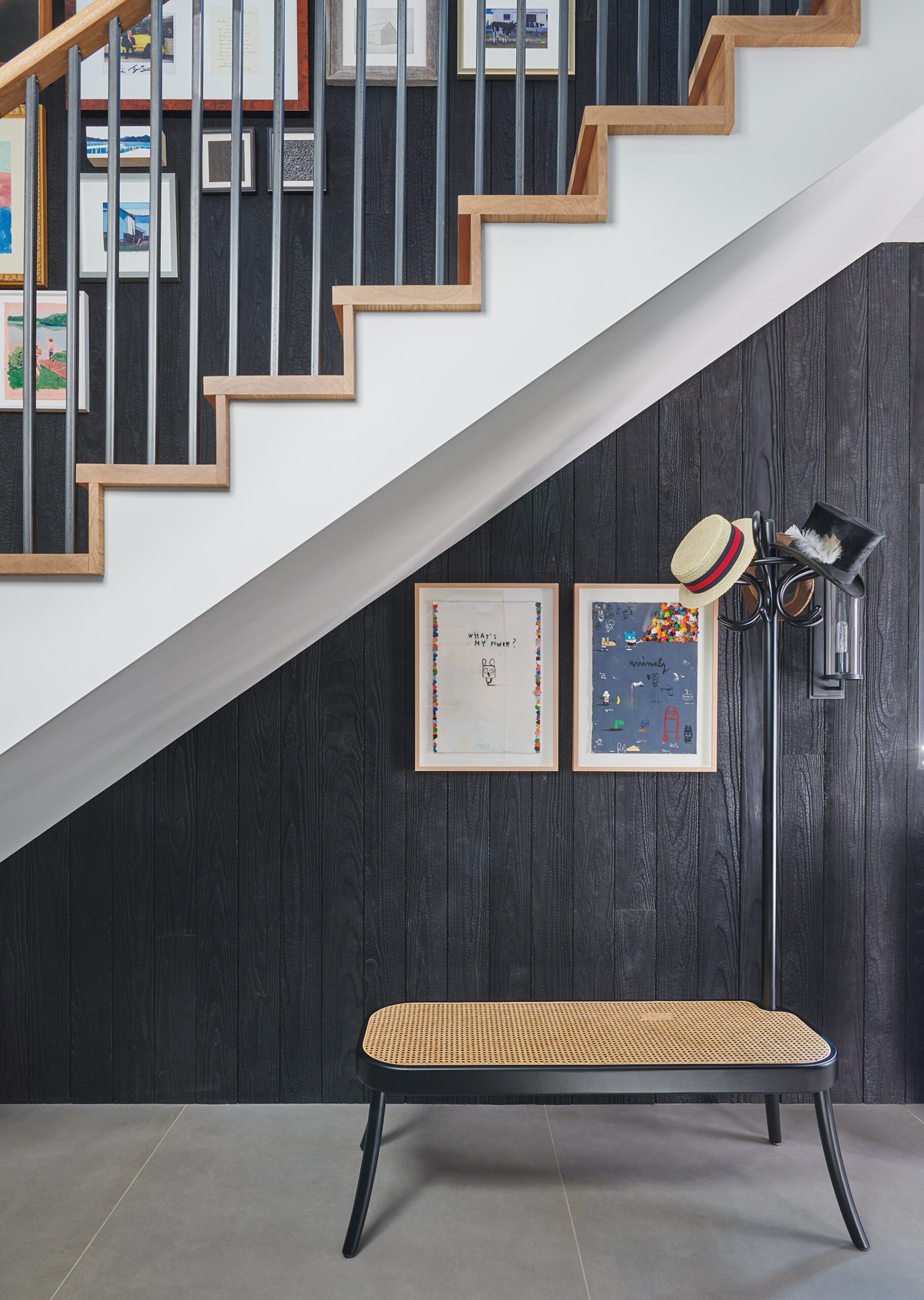 Guest house, wood accent wall features Japanese shou sugi ban finish.