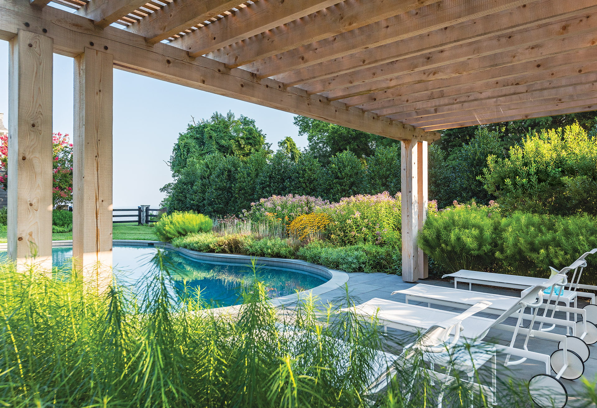 Post-and-beam pergola, chaise longues from Knoll’s Richard Schultz 1966 collection