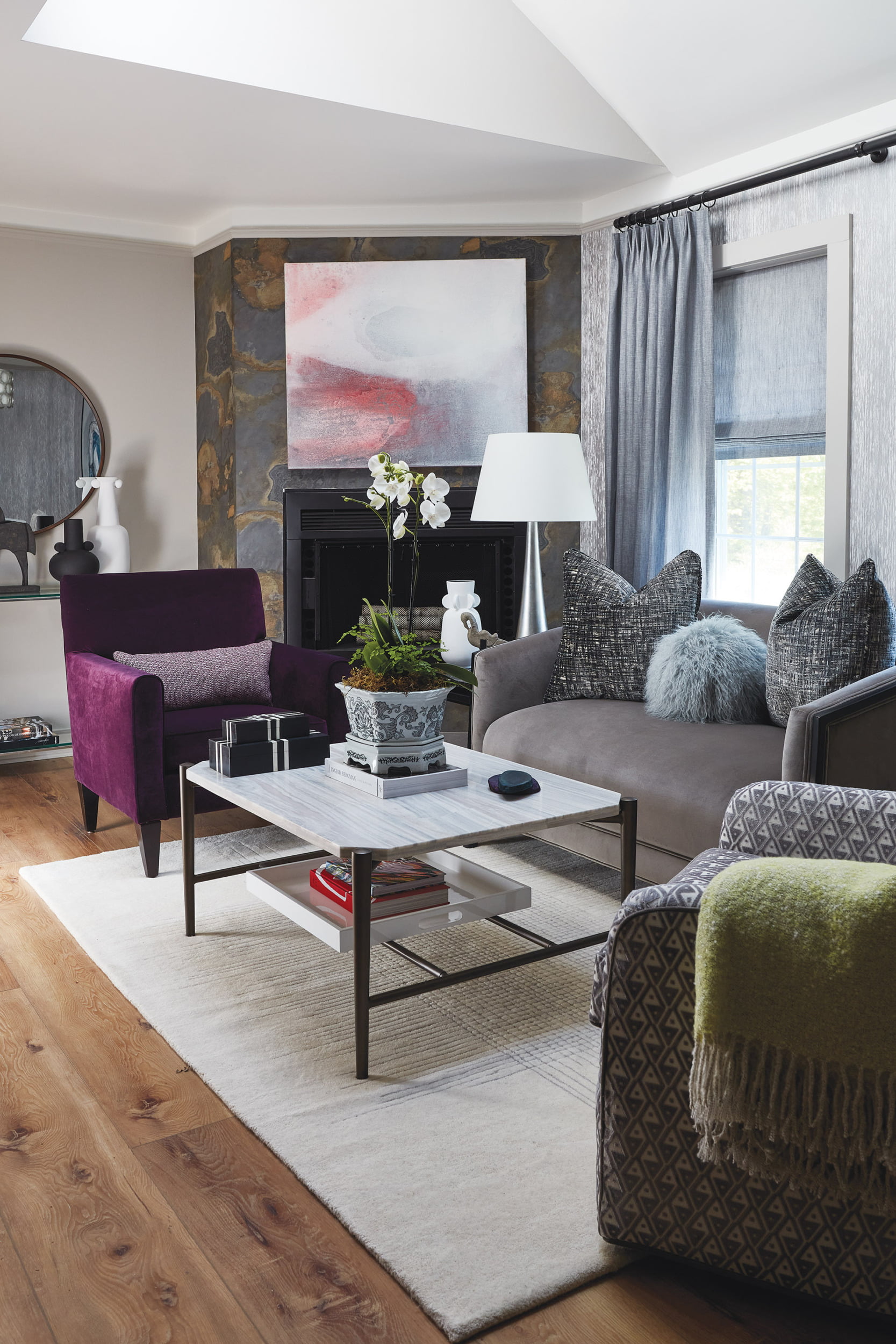 Chic and serene living room. Weitzner wall covering, custom chair in deep violet