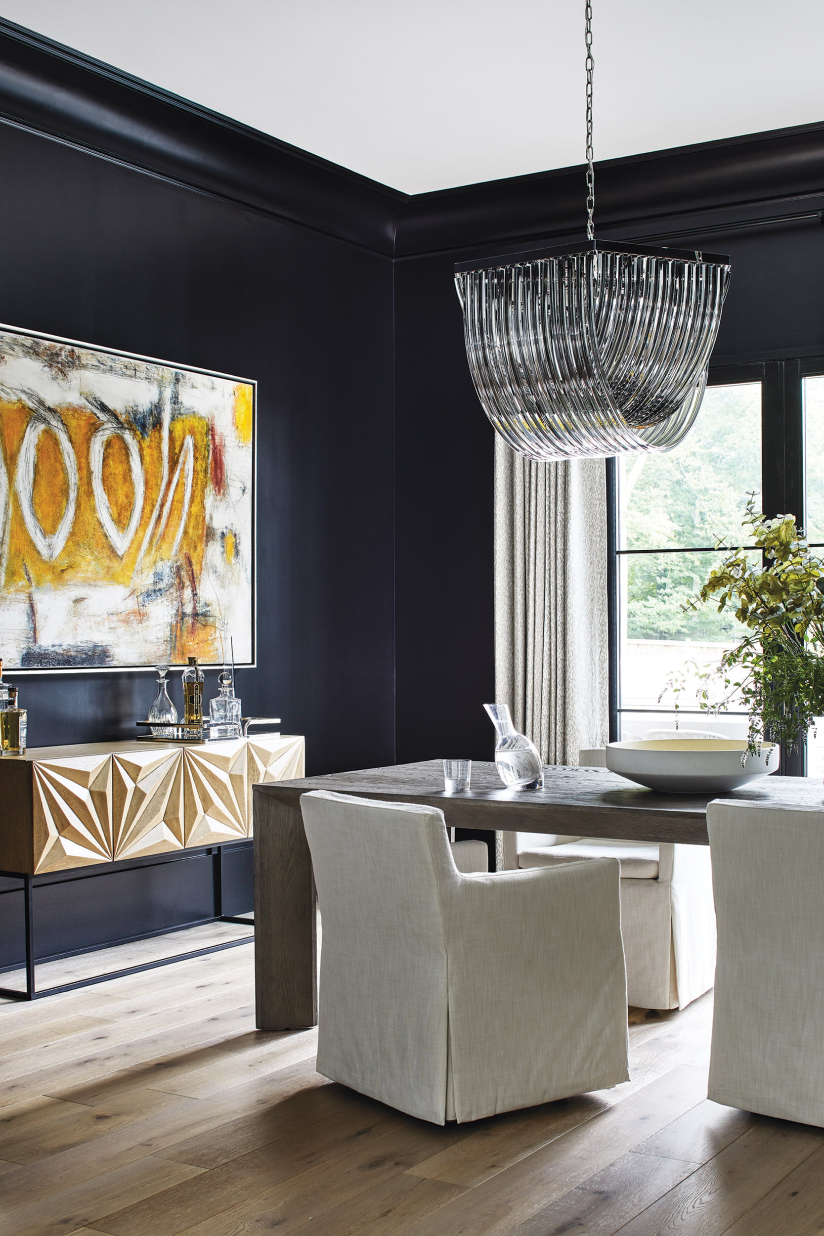 Sideboard from Noir LA in the dining room. The table and chairs are from RH.