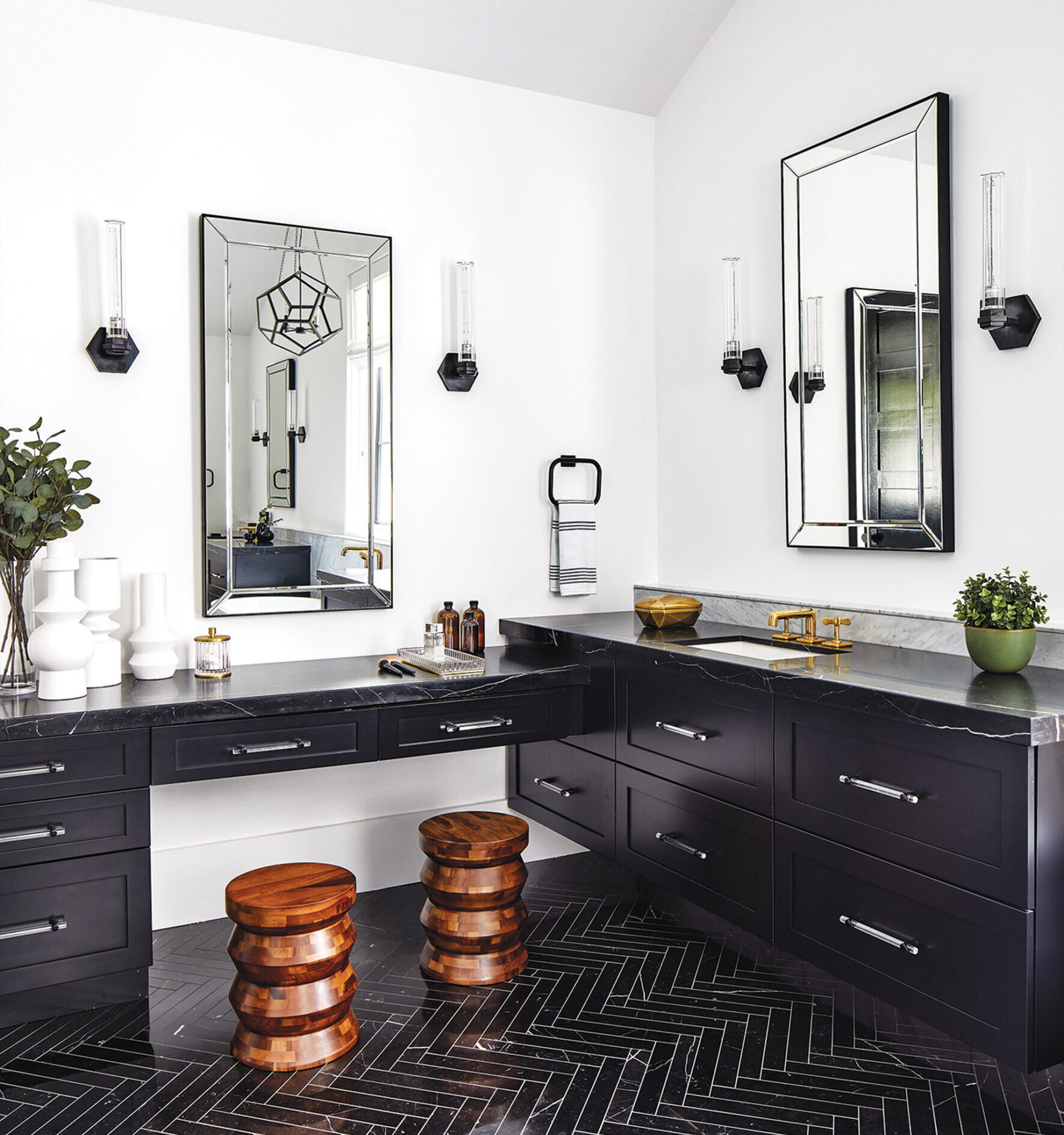 Owners bath, floating his and her vanities are painted glamorous black.