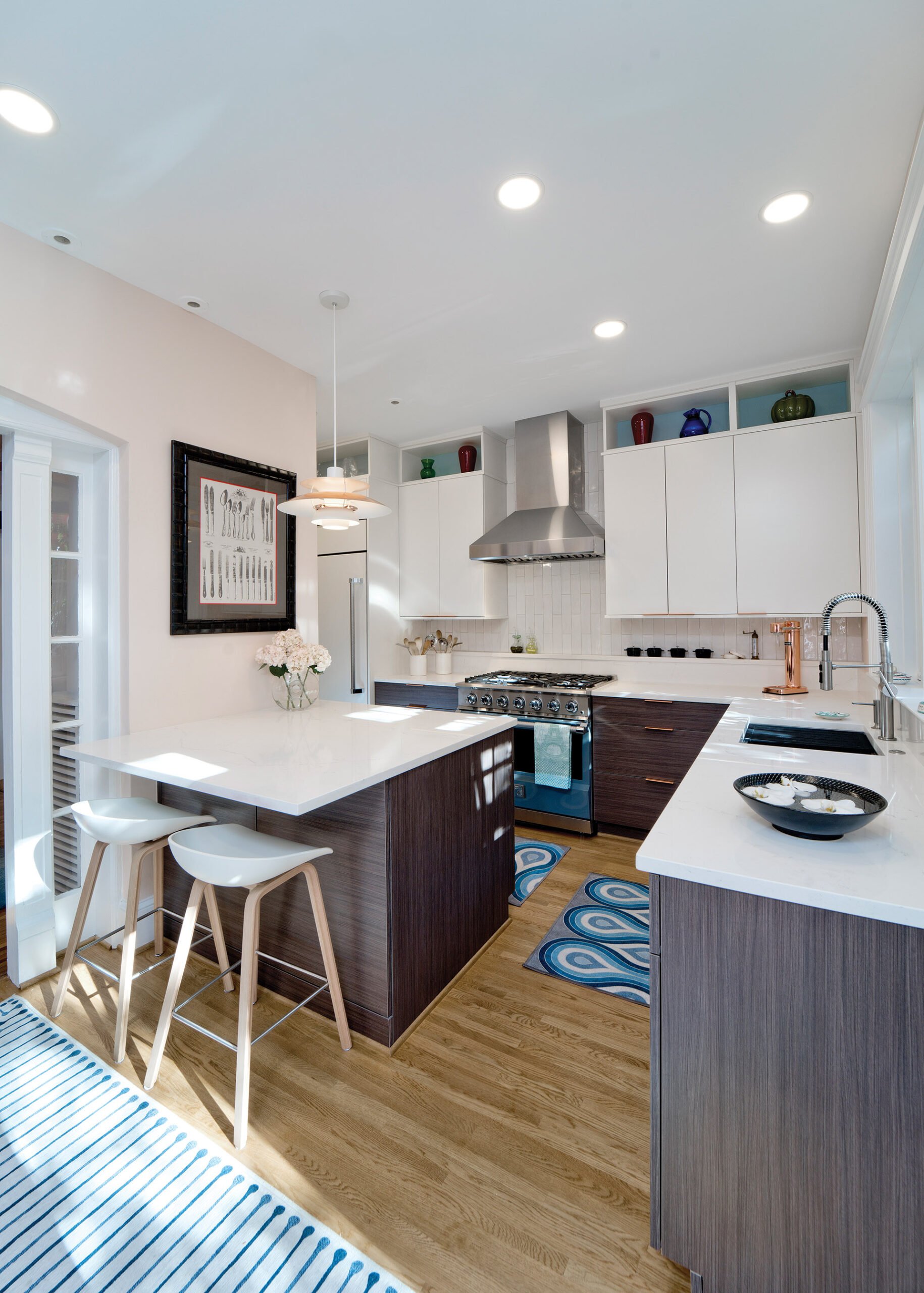 Alabaster and takase teak slab cabinetry from Crystal Cabinet Works. ABW supplied kitchen appliances and tile is from Architessa.
