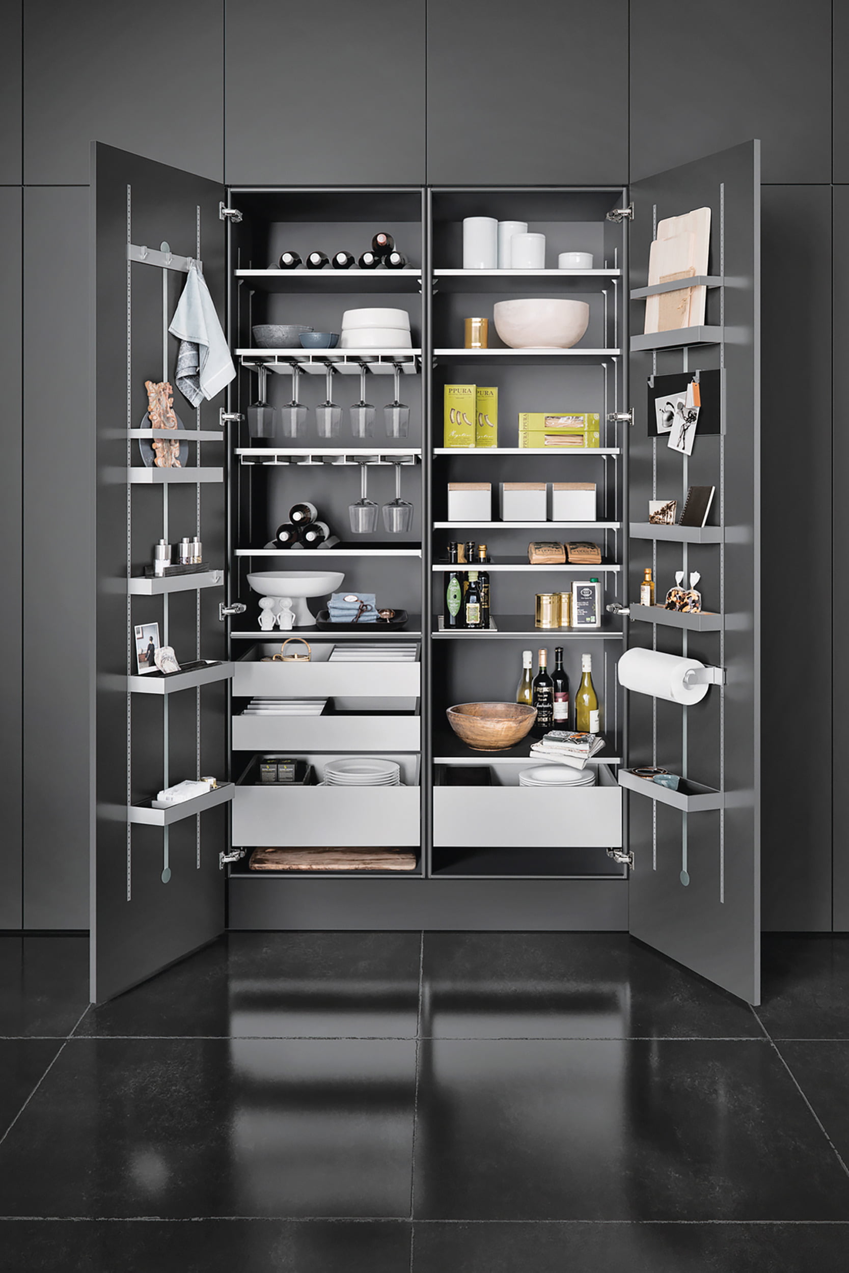 SieMatic’s gray-painted cabinet system featuring modern elegance and functionality | Home and Design Magazine.