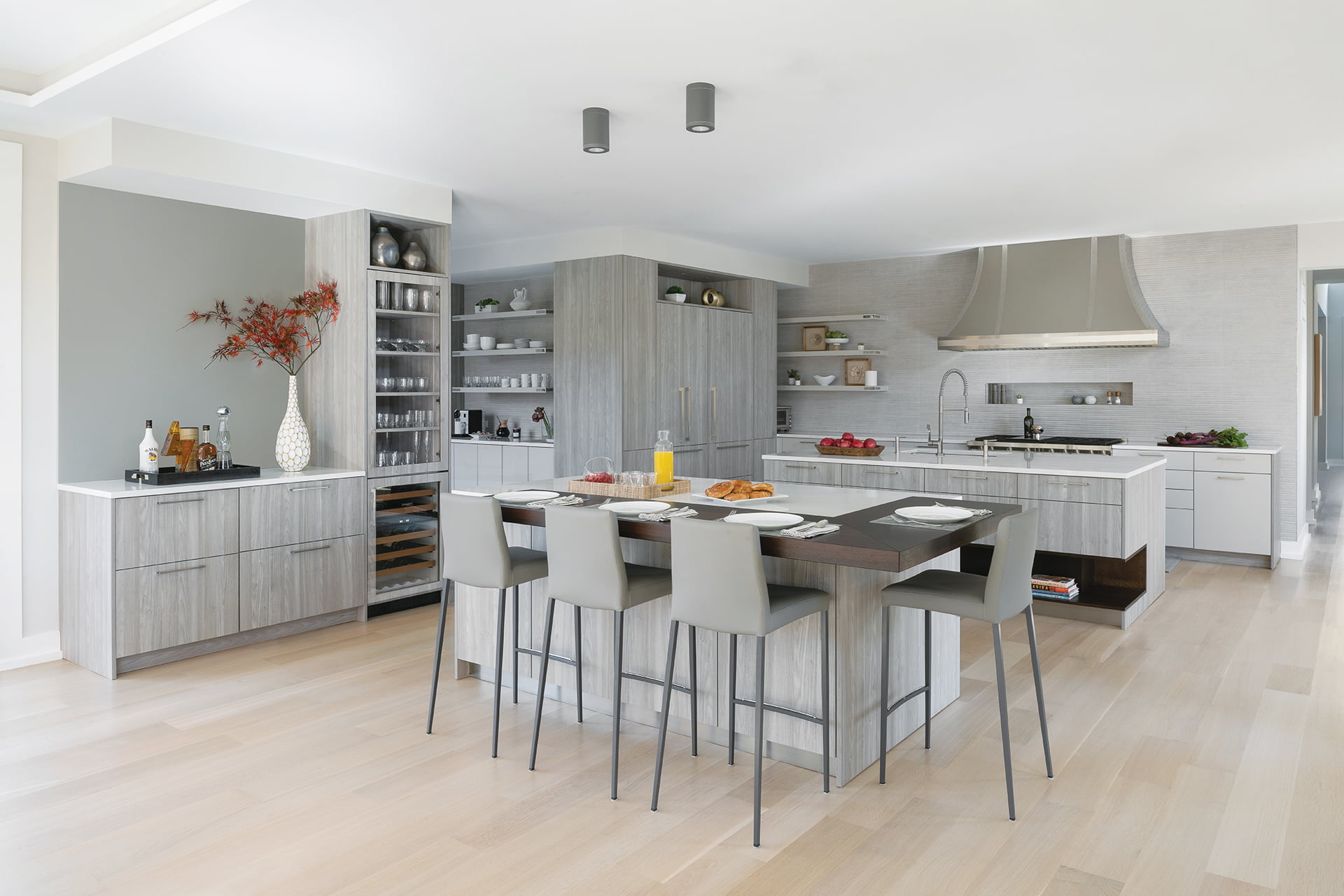 Modern kitchen with two islands, open plan, and natural light | Home and Design