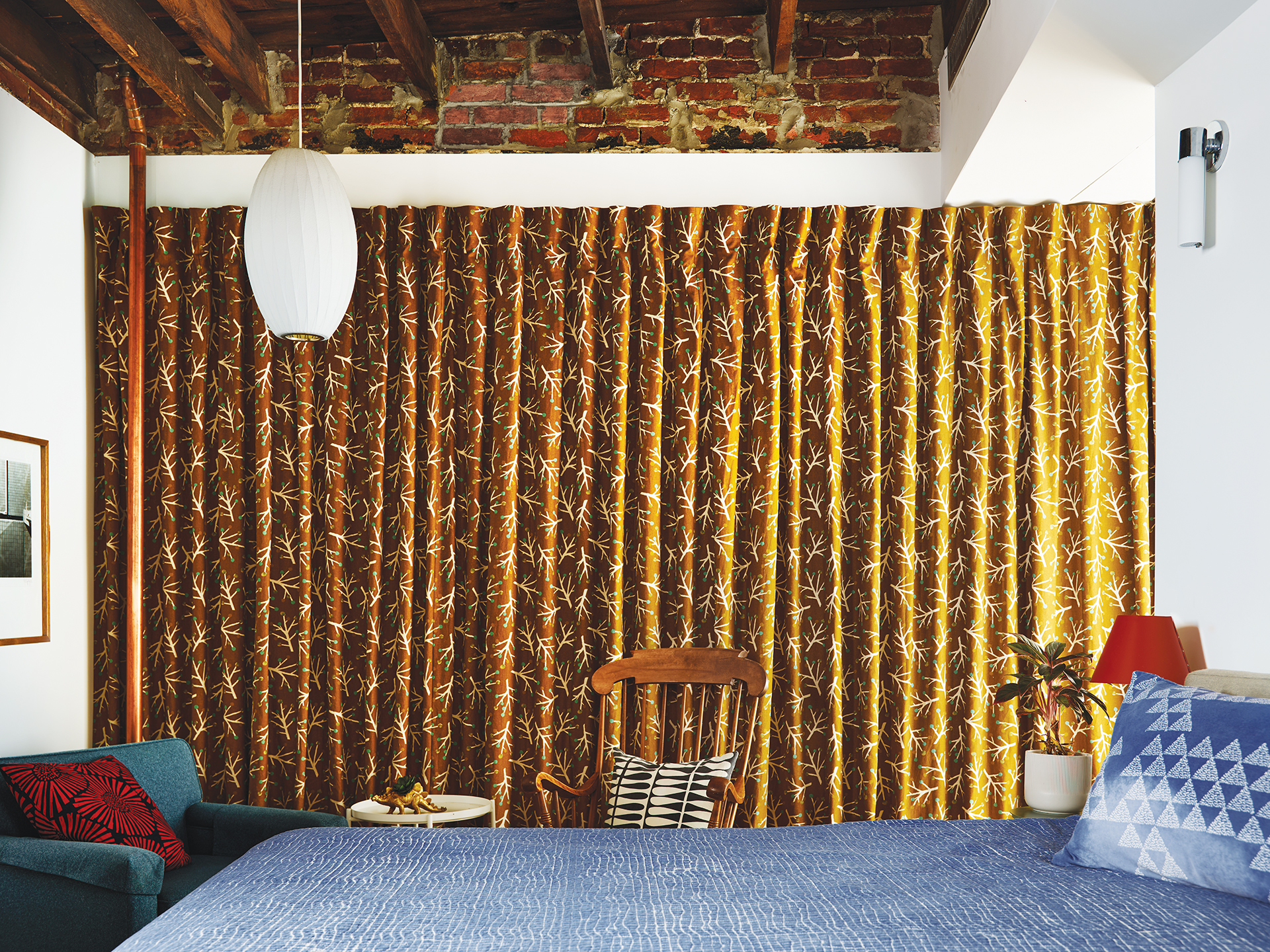 Primary bedroom on the third floor with curtains made from Japanese textile found by Menzer | Home and Design Magazine