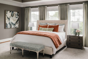 Bedroom designed with a soothing color palette, soft fabrics, beautiful linens, and gentle lighting for a serene atmosphere | Home and Design