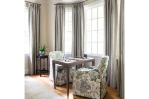 Living room designed as a multi-functional space with a game table and piano for practice and lessons | Home and Design