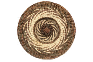 Akebia vines woven into a basket by KARI LONNING | Home and Design Magazine