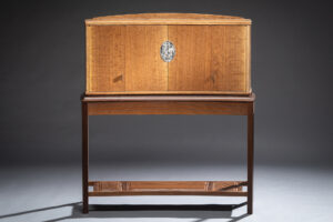 JOHN CAMERON’s handcrafted cabinet made with English brown oak, torrefied ash, and decorative escutcheon plate | Home and Design Magazine