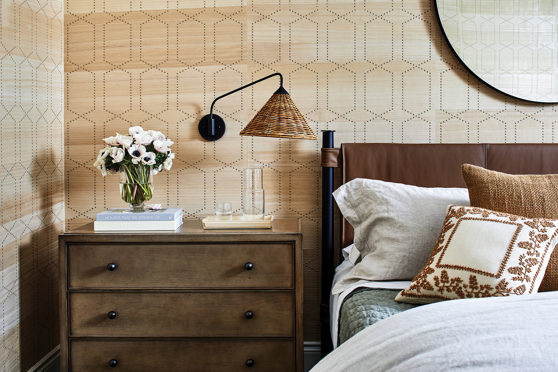 Guest bedroom with Phillip Jeffries raised-rivet wall covering for a sophisticated backdrop | Home and Design