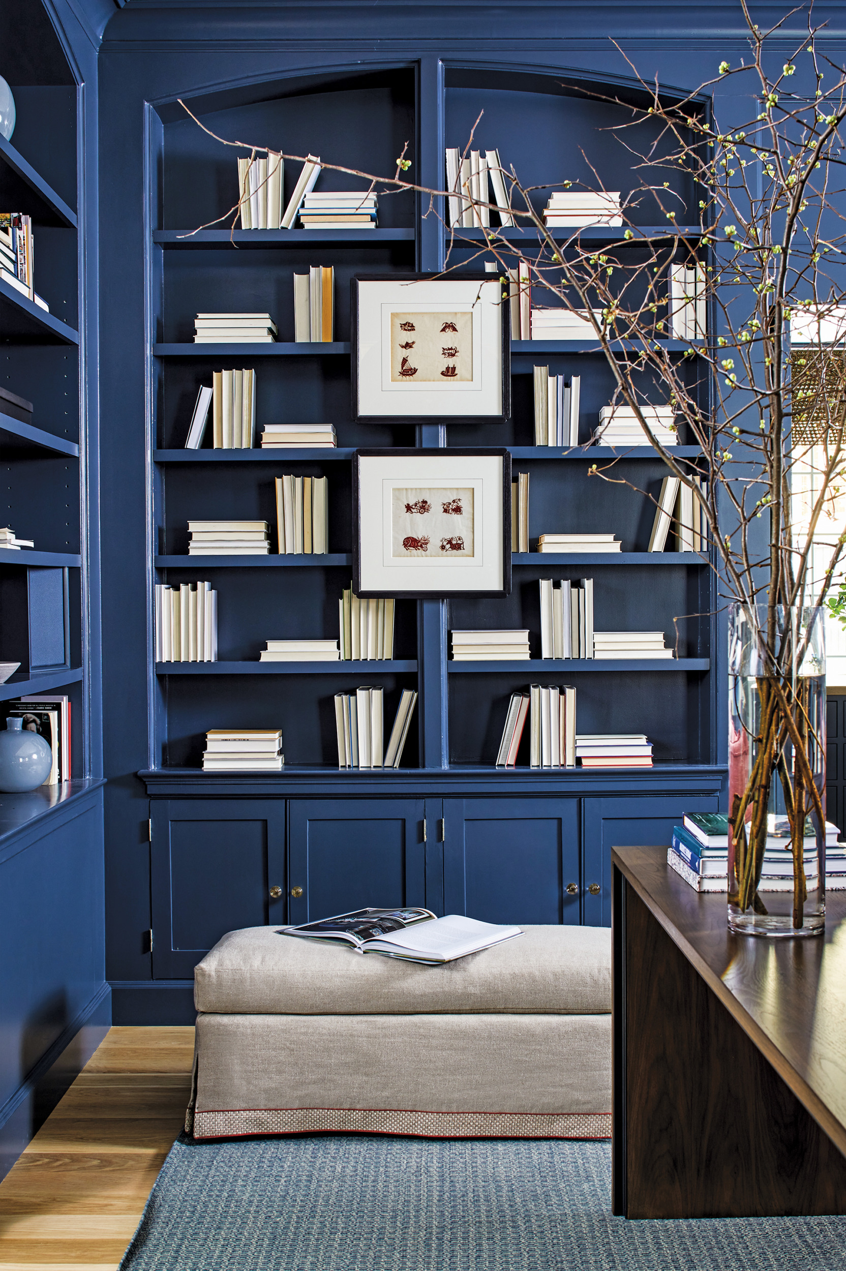 Family room built-ins painted in Benjamin Moore's Hale Navy | Home and Design